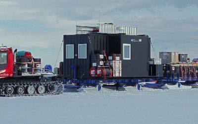 Two piston bully vehicles in an icy landscape