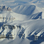 A view of a snow covered mountain.