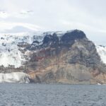 A large mountain in the background